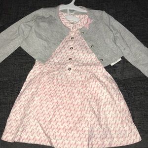 Brand new with tags,  girls dress size 18mos